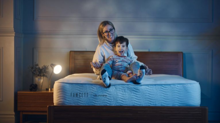 mother and son on the bed