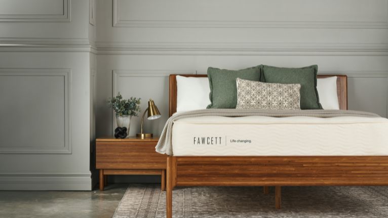 Fawcett Mattress with two green pillows