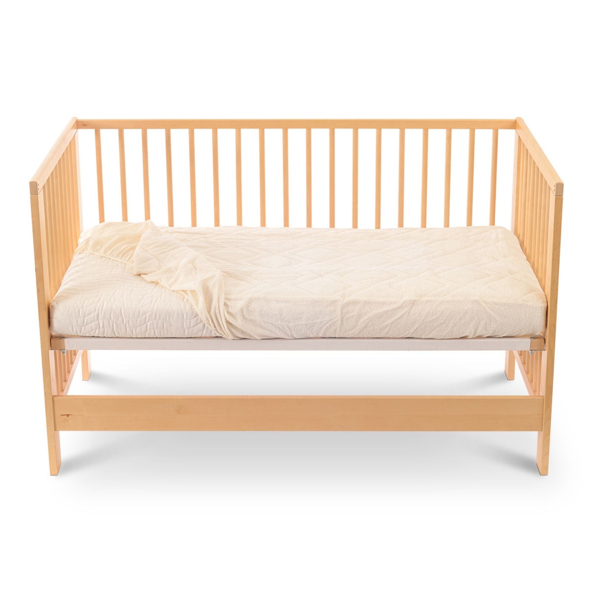 new zealand wool crib mattress protector on crib mattress