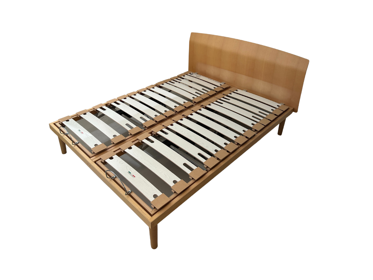 Wooden adjustable bed with white background top view