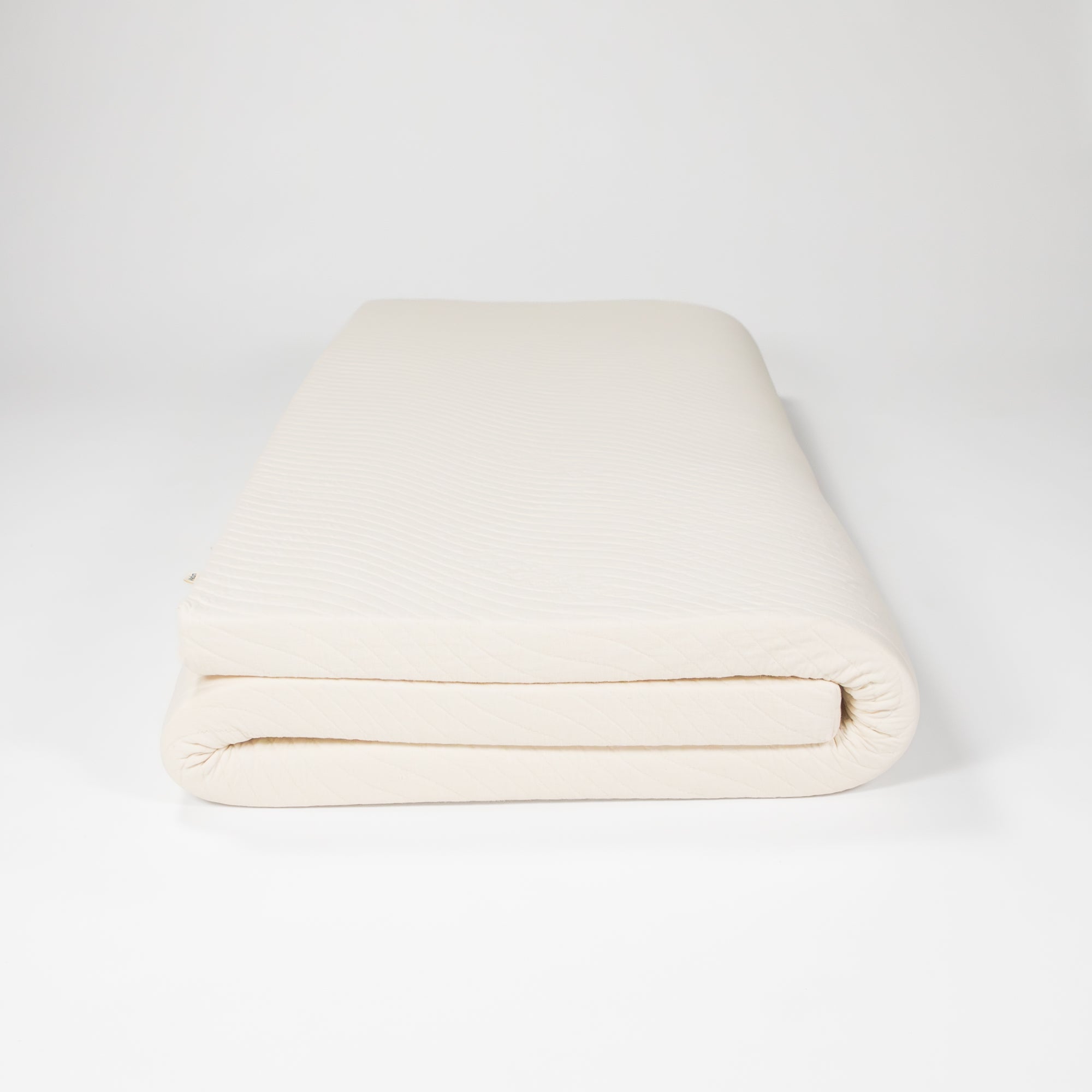 2 inch natural latex topper folded up front view