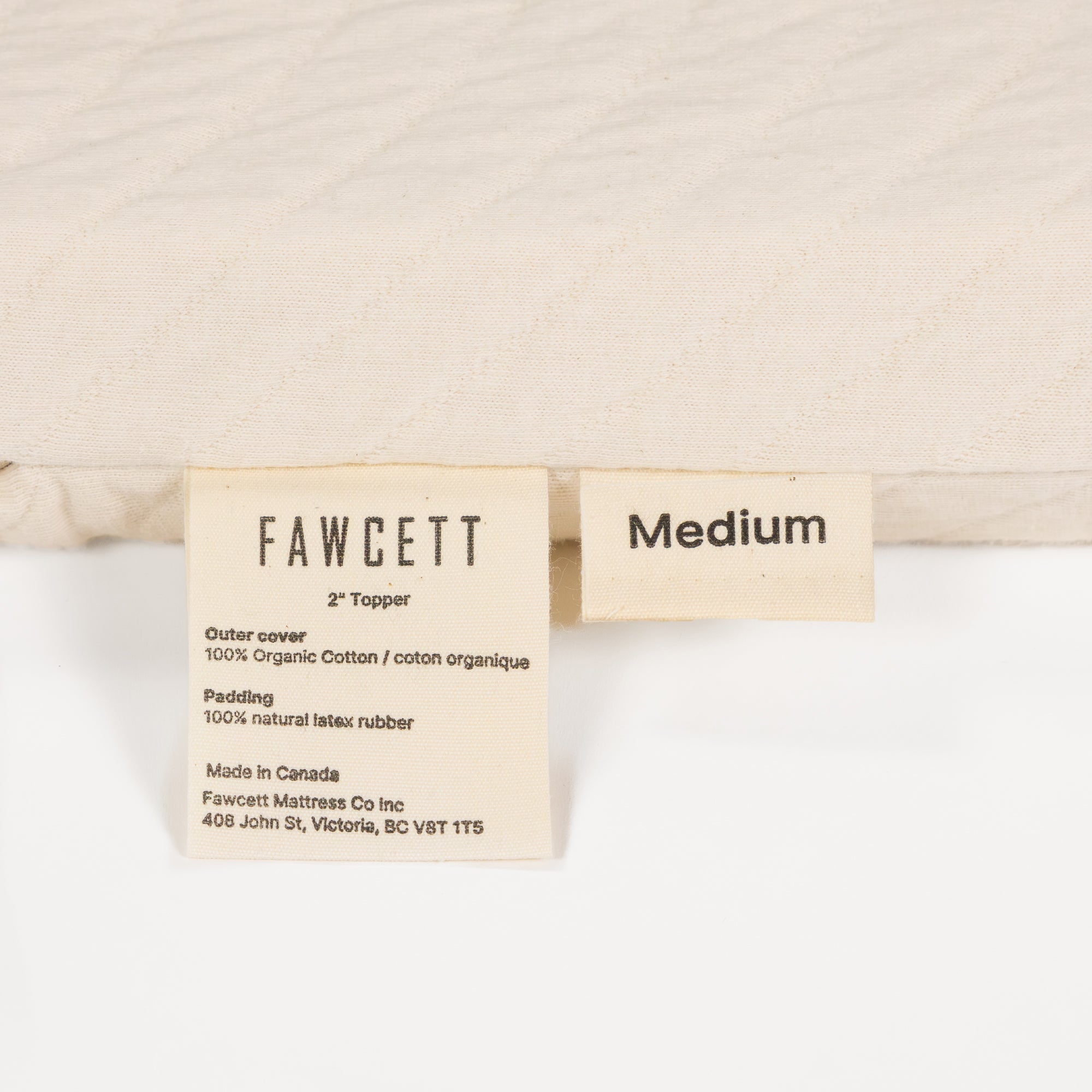 2 inch natural latex topper labels close up