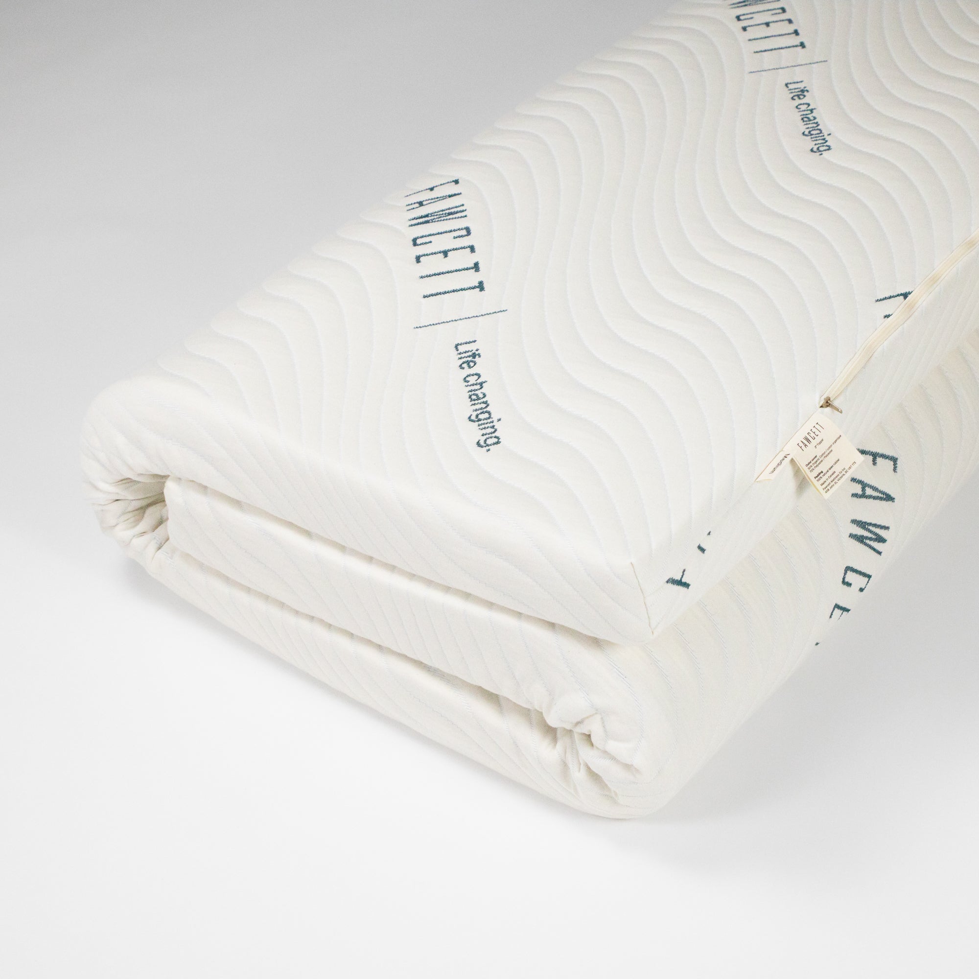 3 inch natural latex topper folded up corner view