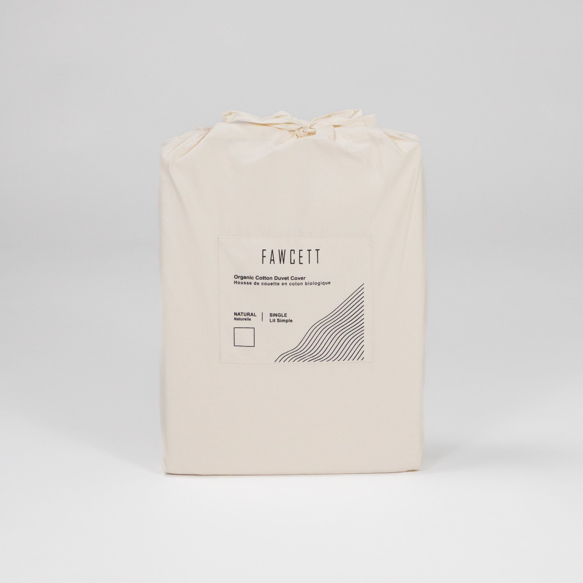 organic cotton duvet cover in packaging front natural