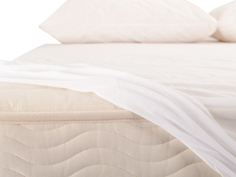 close up of protect a bed mattress protector on a mattress